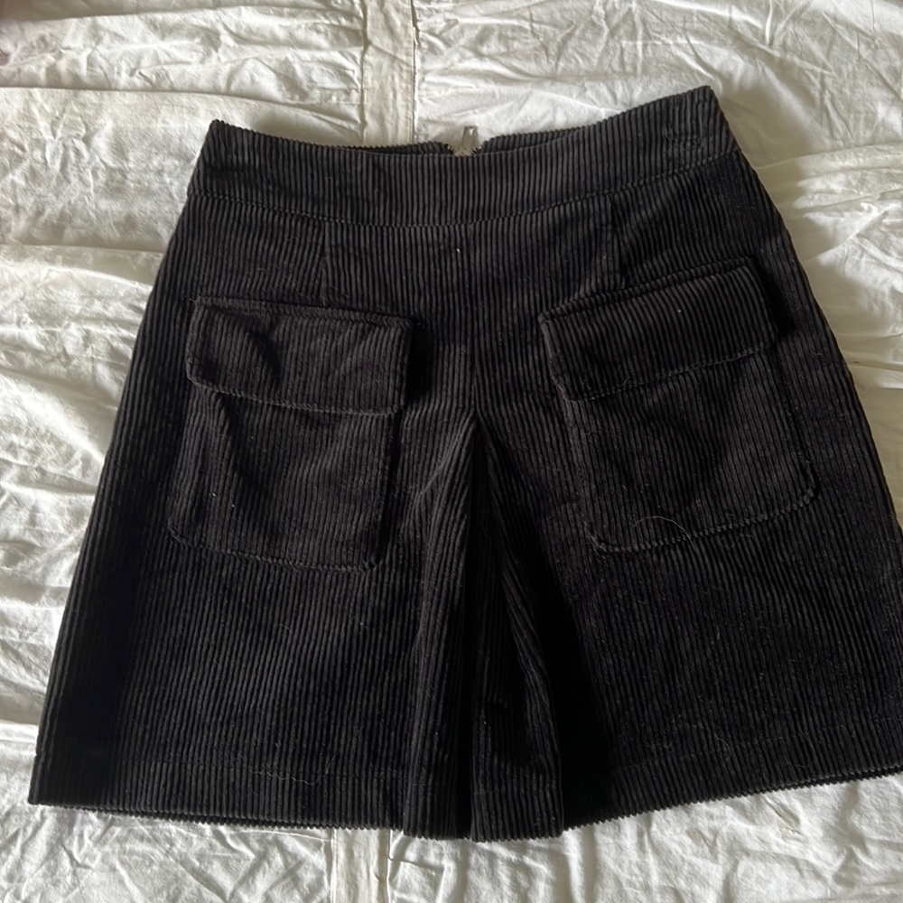 Black corduroy mini skirt